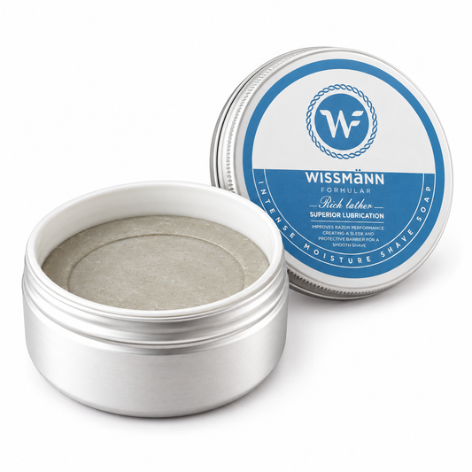 Open tin showing the grey Dead Sea silt shave soap in its inner bowl